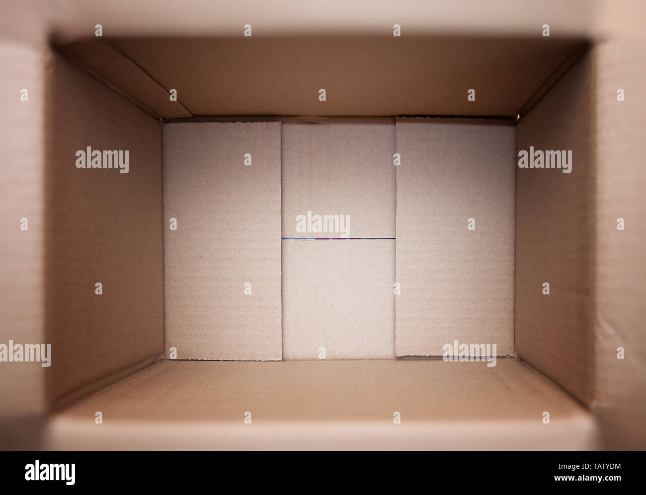 Cardboard box for parcels inside, look inside Stock Photo Alamy