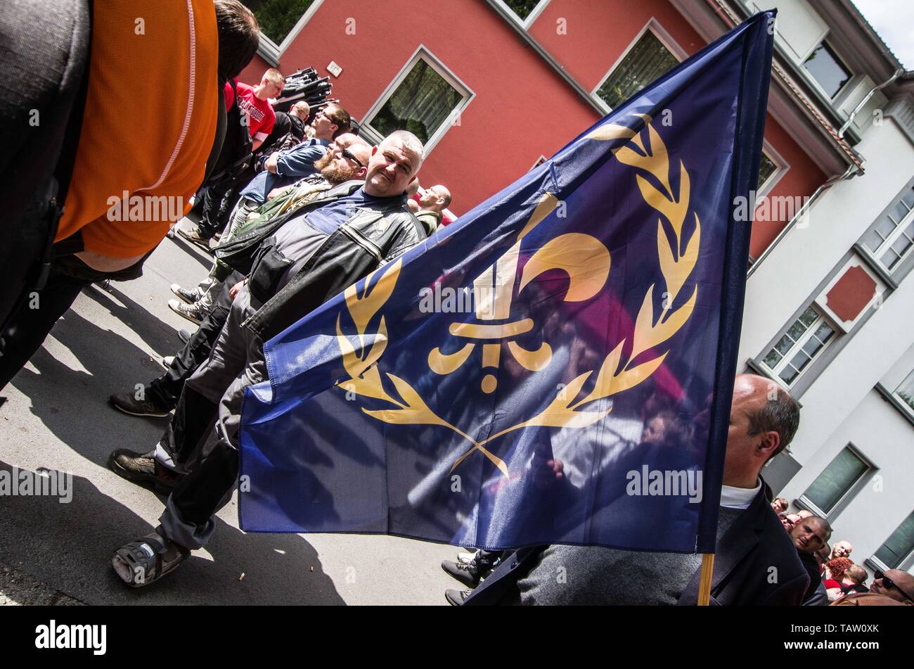 Dortmund, Nordrhein Westfalen, Germany. 25th May, 2019. Supporters of the French Nationalist Party (Parti nationaliste français) were at a neonazi event in Dortmund, Germany. Prior to the European Elections, the neonazi party Die Rechte (The Right) organized a rally in the German city of Dortmund to promote their candidate, the incarcerated Holocaust denier Ursula Haverbeck. The demonstration and march were organized by prominent local political figure and neonazi activist Michael Brueck (Michael BrÃ¼ck) who enlisted the help of not only German neonazis, but also assistance from Russian, Bu Stock Photo