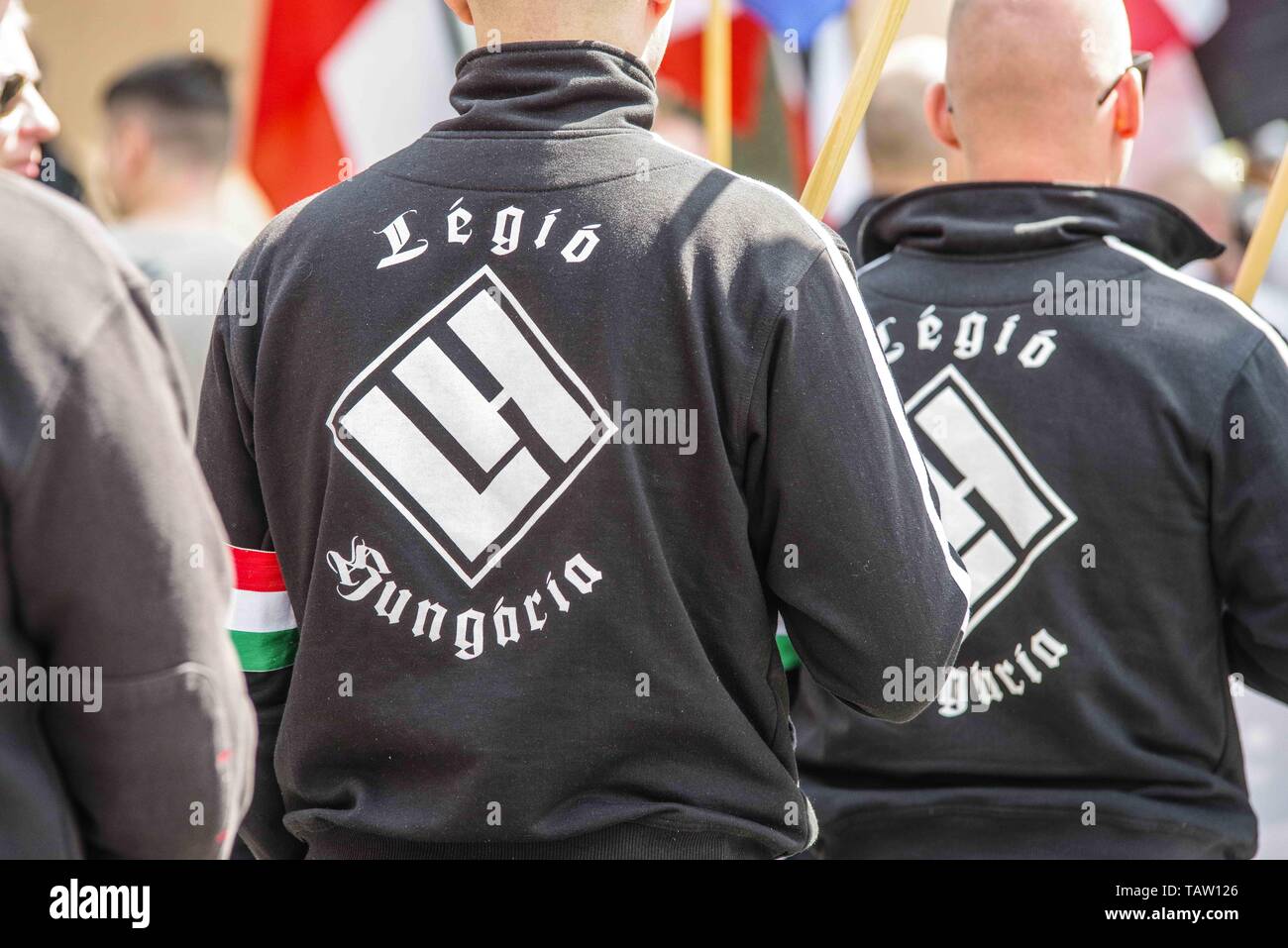 Dortmund, Nordrhein Westfalen, Germany. 25th May, 2019. Neonazis from the Legio Hungaria group as seen in Dortmund, Germany. Prior to the European Elections, the neonazi party Die Rechte (The Right) organized a rally in the German city of Dortmund to promote their candidate, the incarcerated Holocaust denier Ursula Haverbeck. The demonstration and march were organized by prominent local political figure and neonazi activist Michael Brueck (Michael BrÃ¼ck) who enlisted the help of not only German neonazis, but also assistance from Russian, Bulgarian, Hungarian, and Dutch groups with the final Stock Photo