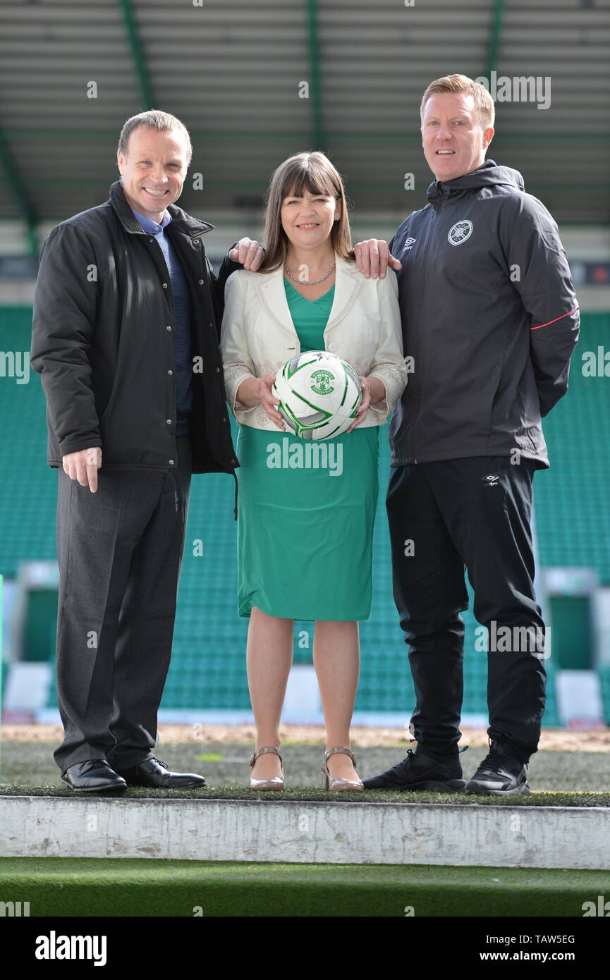 Edinburgh, UK. 28th May, 2019. PICTURED: (left-right) Gary Locke; Clare Haughey; Mickey Weir. The Mental Health Minister will be joined by former Hearts player Gary Locke and a former Hibs player, as well as representatives from the SPFL and partner organisations. Mental Health Minister Clare Haughey launch es new mental health and suicide prevention training at Hibernian Football Club. All 42 Scottish Premier Football League (SPFL) clubs have committed to roll-out the training to all players and staff. Credit: Colin Fisher/Alamy Live News Stock Photo