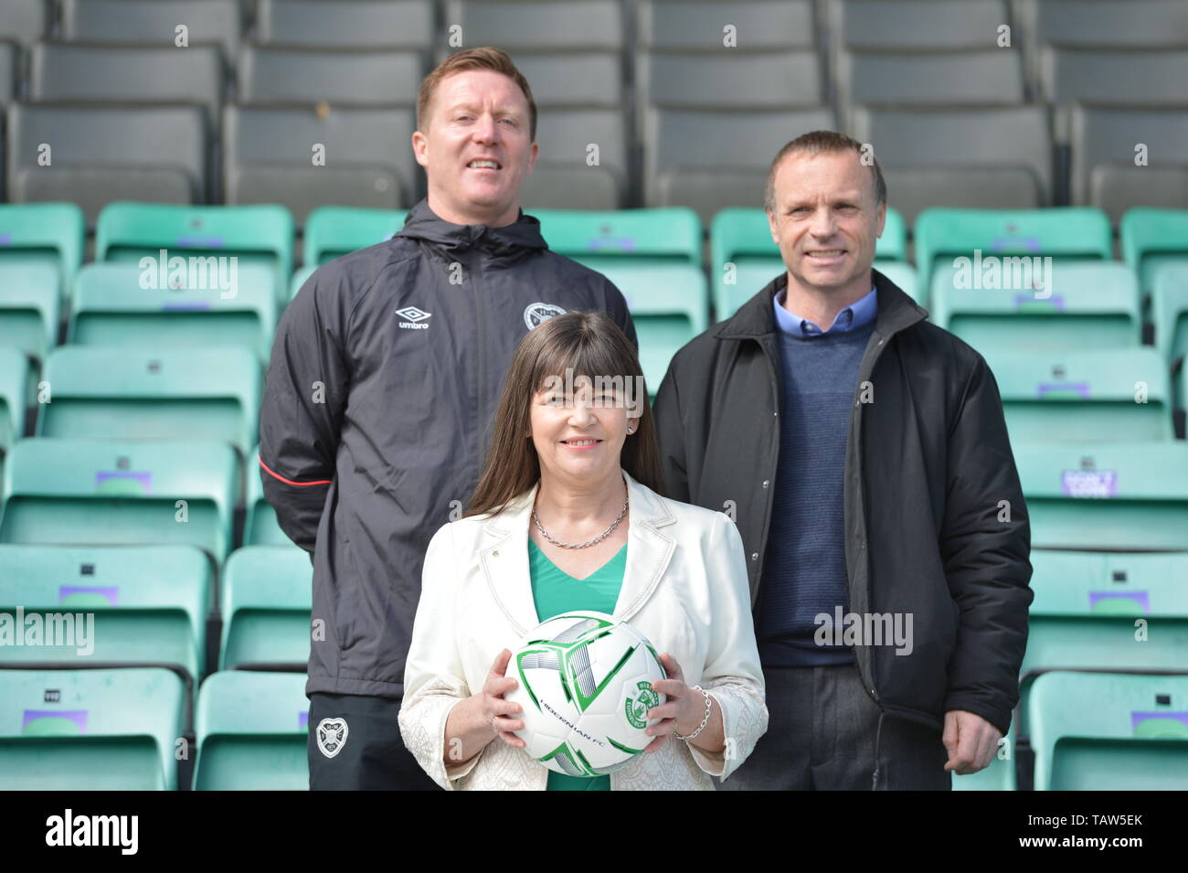 Edinburgh, UK. 28th May, 2019. PICTURED: (left-right) Gary Locke; Clare Haughey; Mickey Weir. The Mental Health Minister will be joined by former Hearts player Gary Locke and a former Hibs player, as well as representatives from the SPFL and partner organisations. Mental Health Minister Clare Haughey launch es new mental health and suicide prevention training at Hibernian Football Club. All 42 Scottish Premier Football League (SPFL) clubs have committed to roll-out the training to all players and staff. Credit: Colin Fisher/Alamy Live News Stock Photo