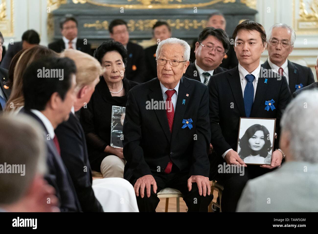 U.S. President Donald Trump and Japanese Prime Minister Shinzo Abe meet with families of those abducted by North Korea at the Akasaka Palace May 27, 2019 in Tokyo, Japan. Stock Photo