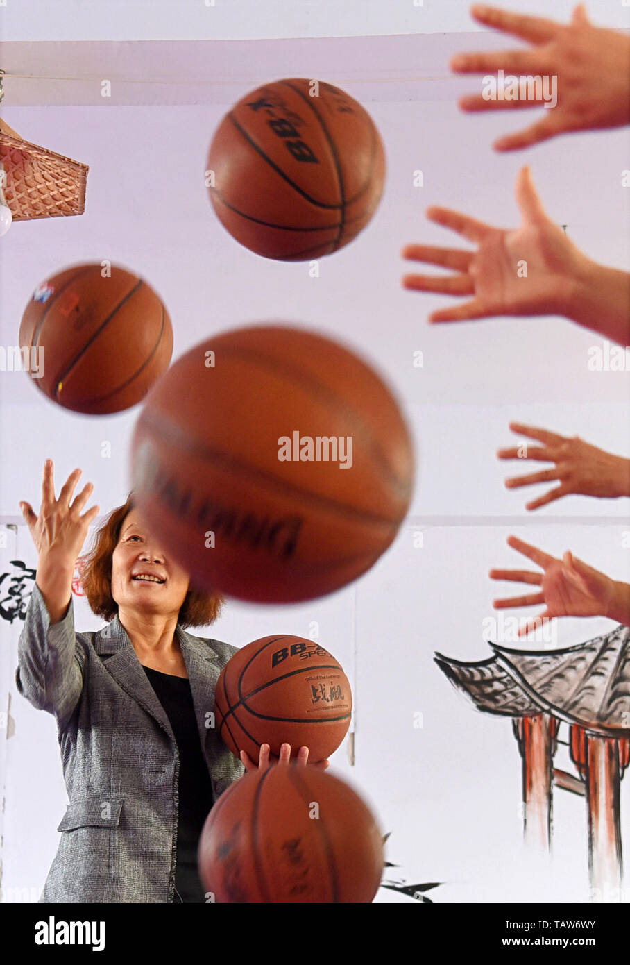 (190528) -- ZIBO, May 28, 2019 (Xinhua) -- Yang Qinghong helps children with disabilities conduct sensory integration training in Yiyuan County of Zibo, east China's Shandong Province, May 16, 2019. Yang Qinghong, a 49-year-old caretaker with disability in Yiyuan County of Zibo, has been dedicated to taking care of the elderly and disabled people. With the help of local government, Yang started rehabilitation and day care centers for elderly people. She also provided rehabilitation and care service for children living with disabilities to help them make a living on their own in the future. (Xi Stock Photo