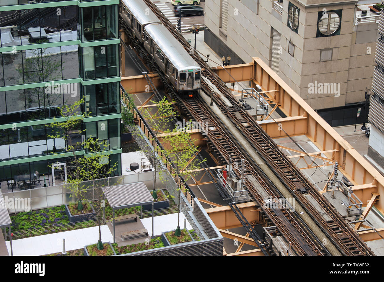 Chicago L Train on its elevated train track downtown in the Loop