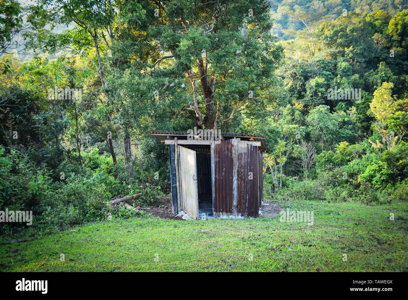 Old wooden toilet forest with zinc roof on mountains in a village hill -  Outhouse toilet cabins Stock Photo - Alamy