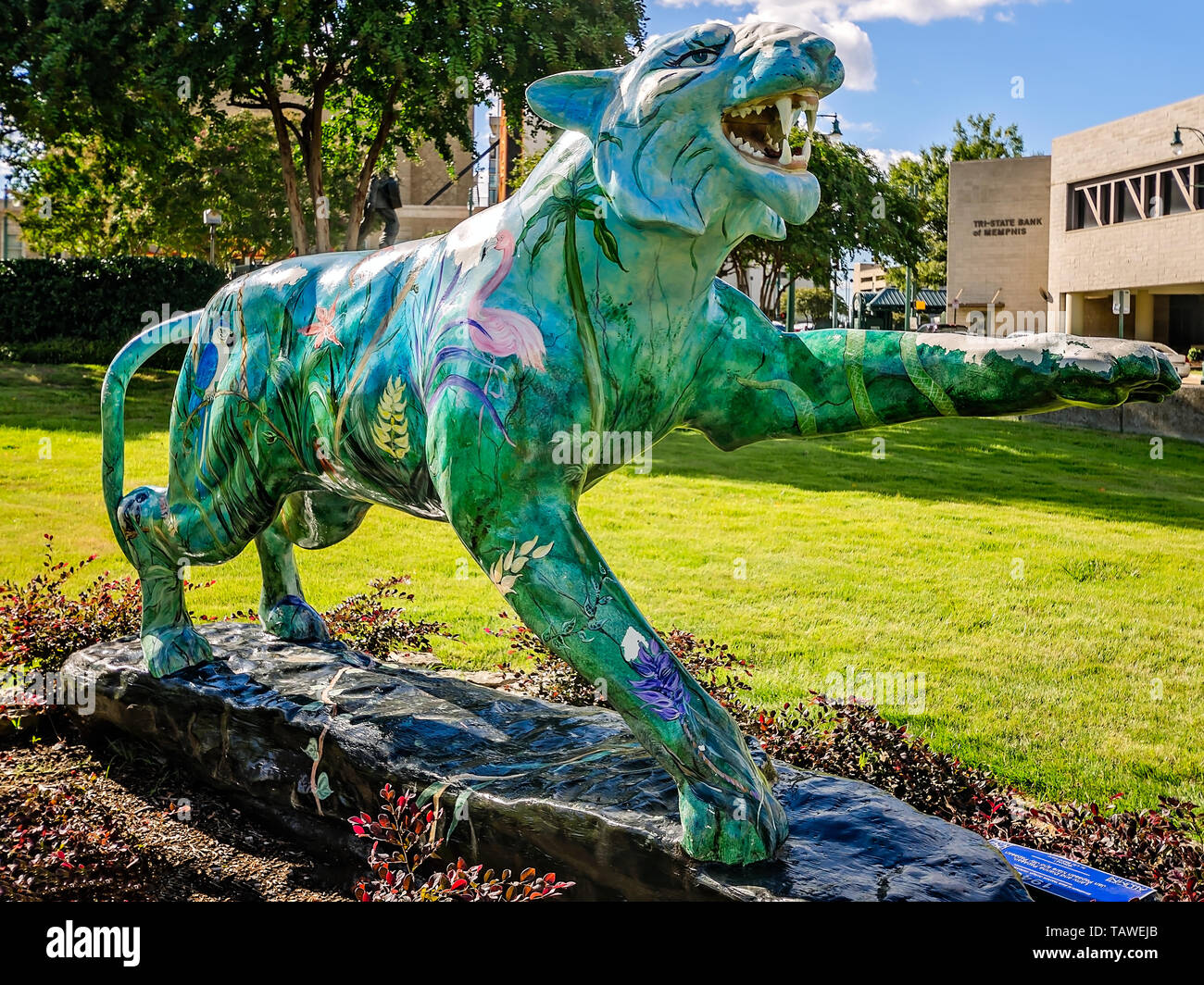 A painted tiger statue is displayed downtown, Sept. 12, 2015, in Memphis, Tennessee. The Tigers Around Town display features 100 painted tigers. Stock Photo