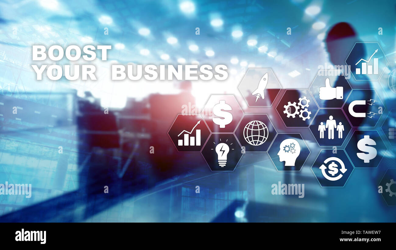 Financial and Technology concept. On a virtual screen inscription: Boost Your Business. Stock Photo