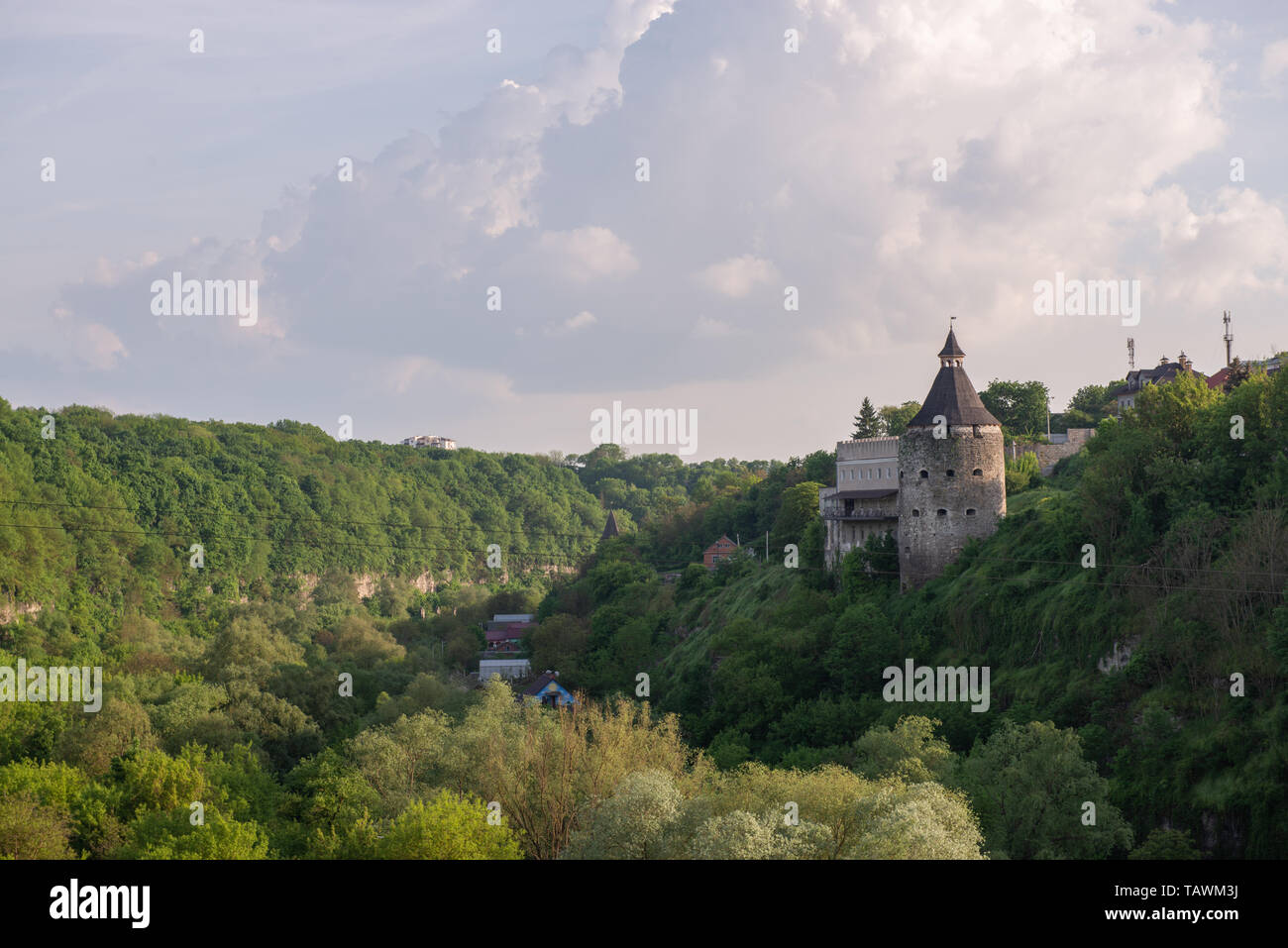 Tower of a medieval stone fortress on a hill Stock Photo - Alamy