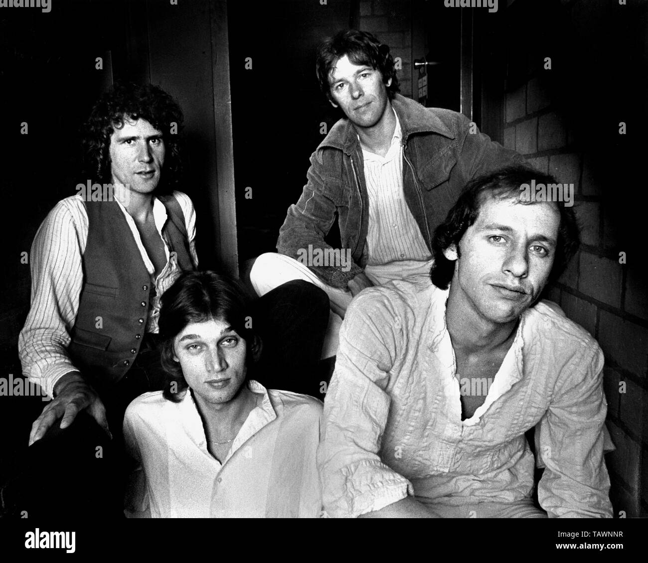 Dire straits 1984. Гитарист dire straits. Dire straits 1984. Группа dire straits. Дайер стрейтс братья.