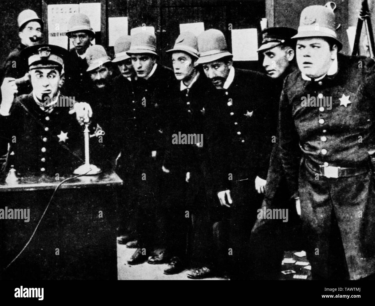 ford sterling, edgar kennedy ,william frawley, roscoe arbuckle, al st. john, the clutches of the gang, 1914 Stock Photo