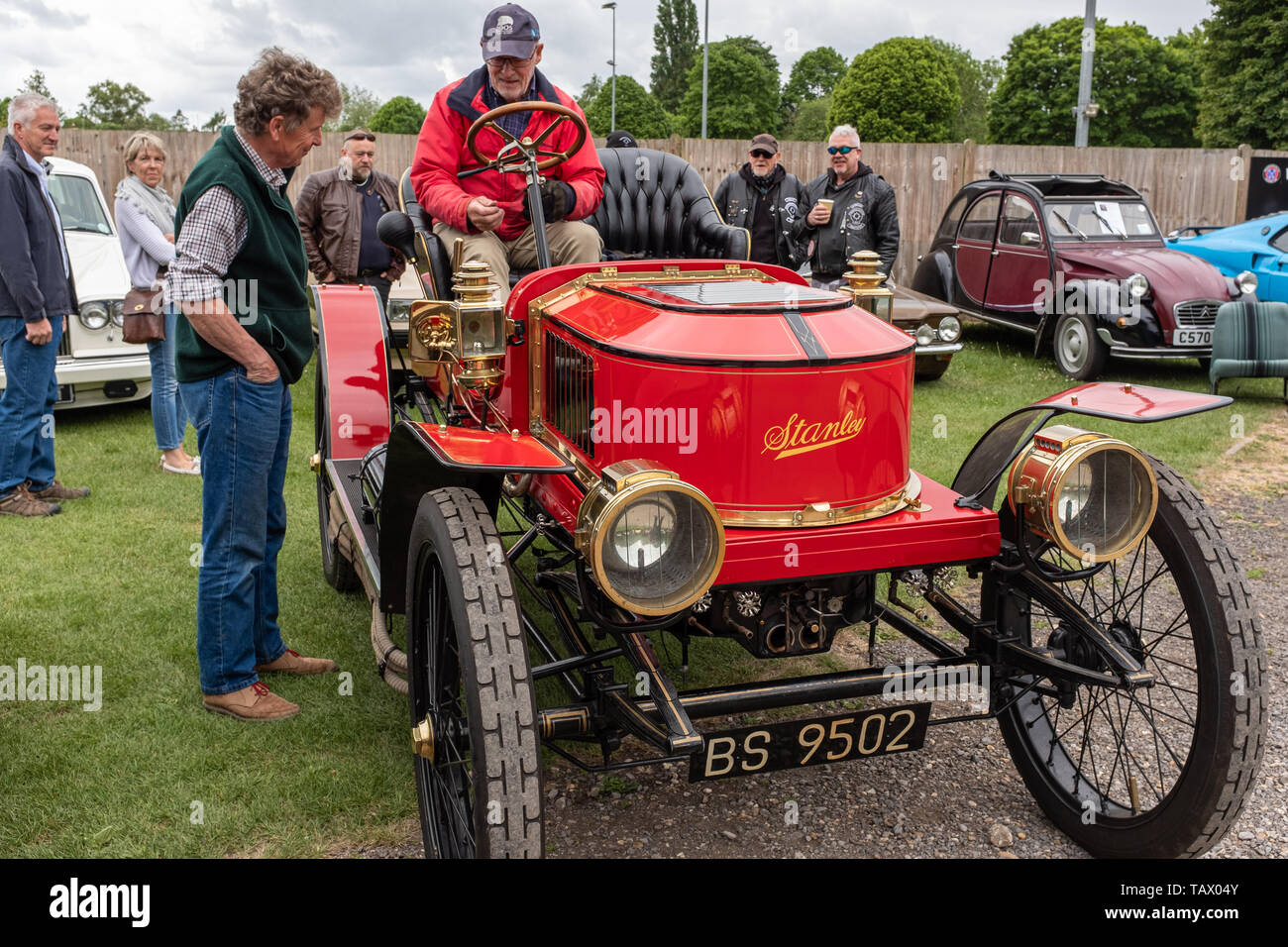 Red Stanley Steamer, a steam-powered car, at the Winchester Classic car and motorbike meet, Winchester, Hampshire, UK Stock Photo