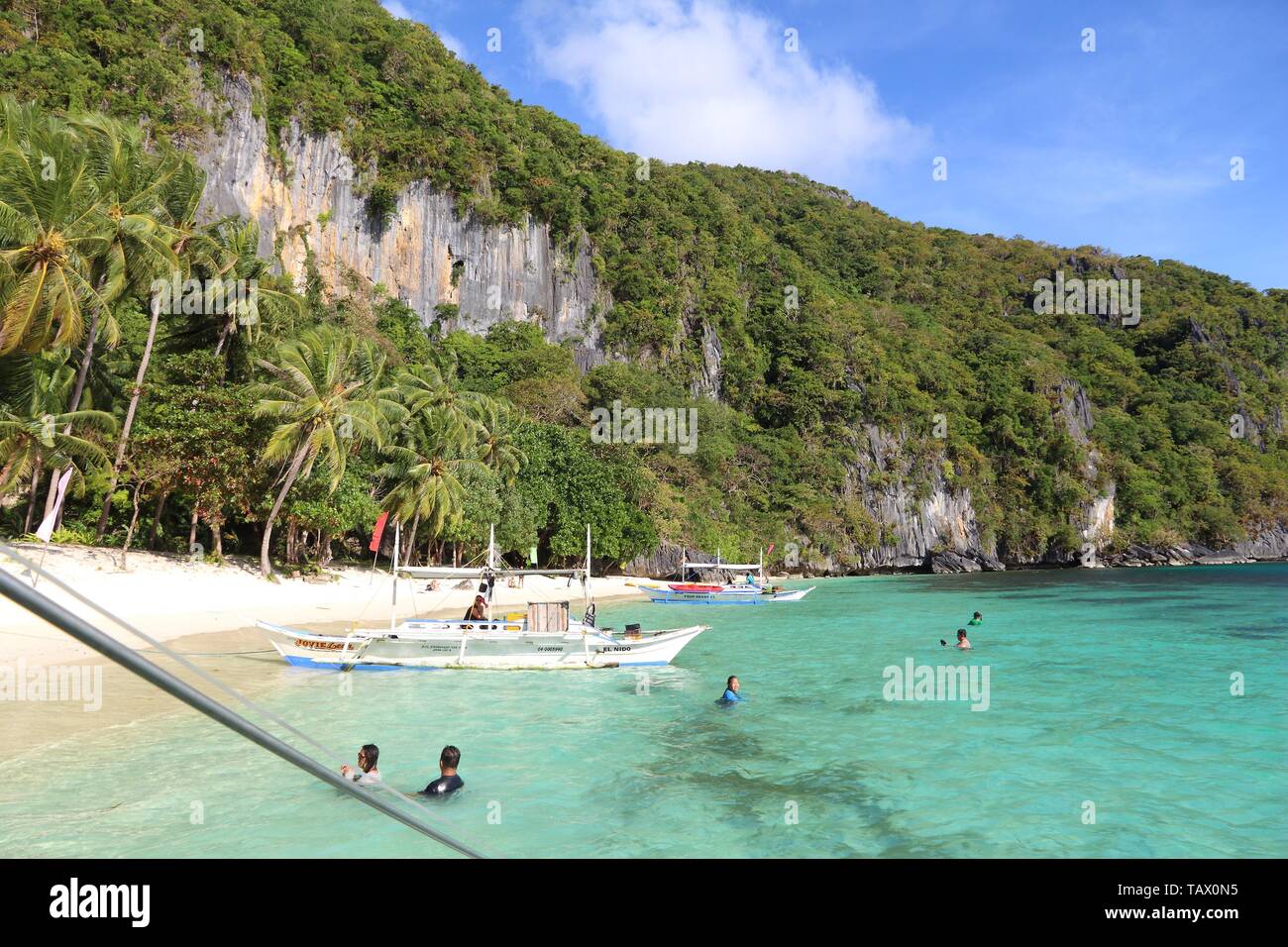 PALAWAN, PHILIPPINES DECEMBER 1, 2017 People visit Papaya Beach on
