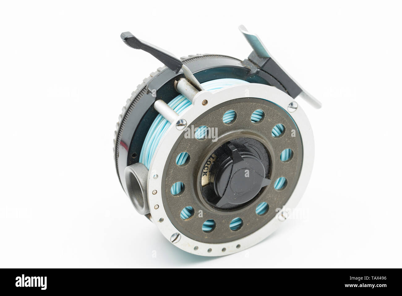 Old Automatic Retrieve Fly Fishing Reel On White Stock Photo