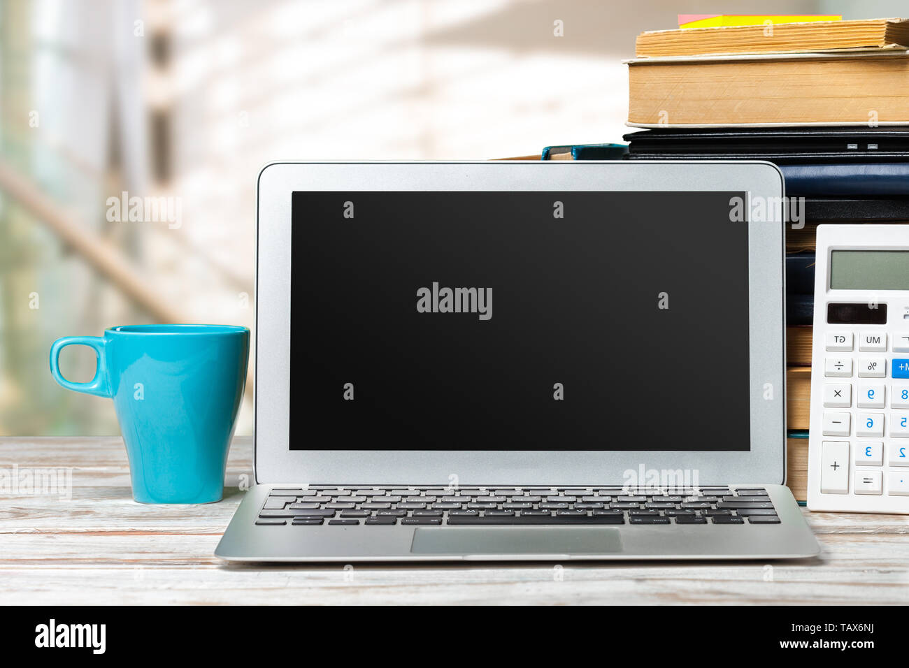 Computer screen on a working table front view Stock Photo - Alamy