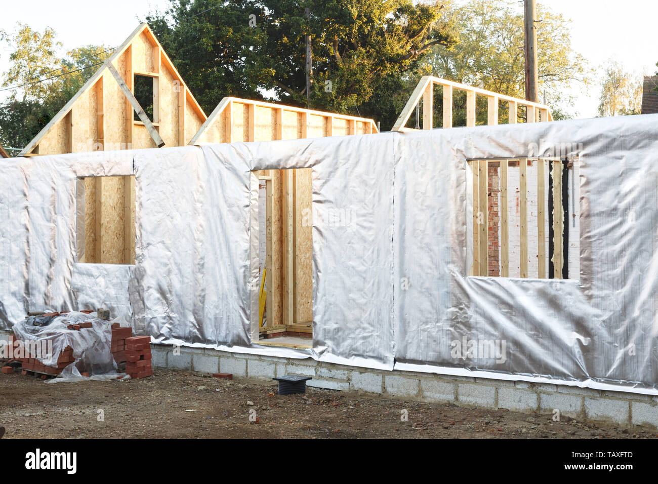 Modern house construction with timber frame and foil wall insulation Stock Photo