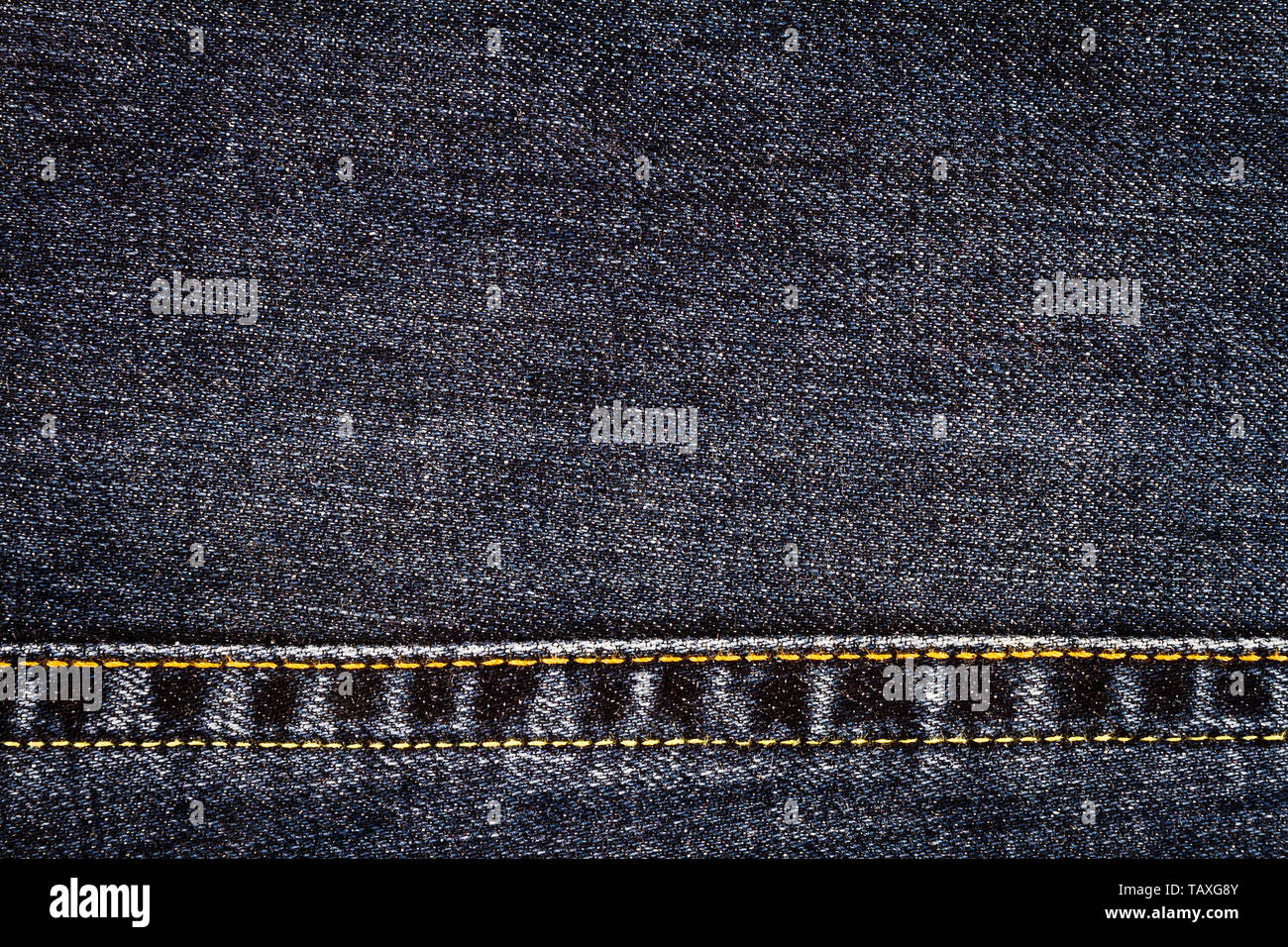 Black jeans texture. Denim jeans fabric background with a seam Stock ...