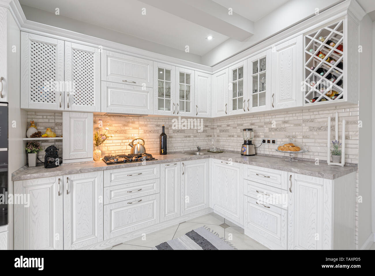 modern white wooden kitchen interior Stock Photo - Alamy