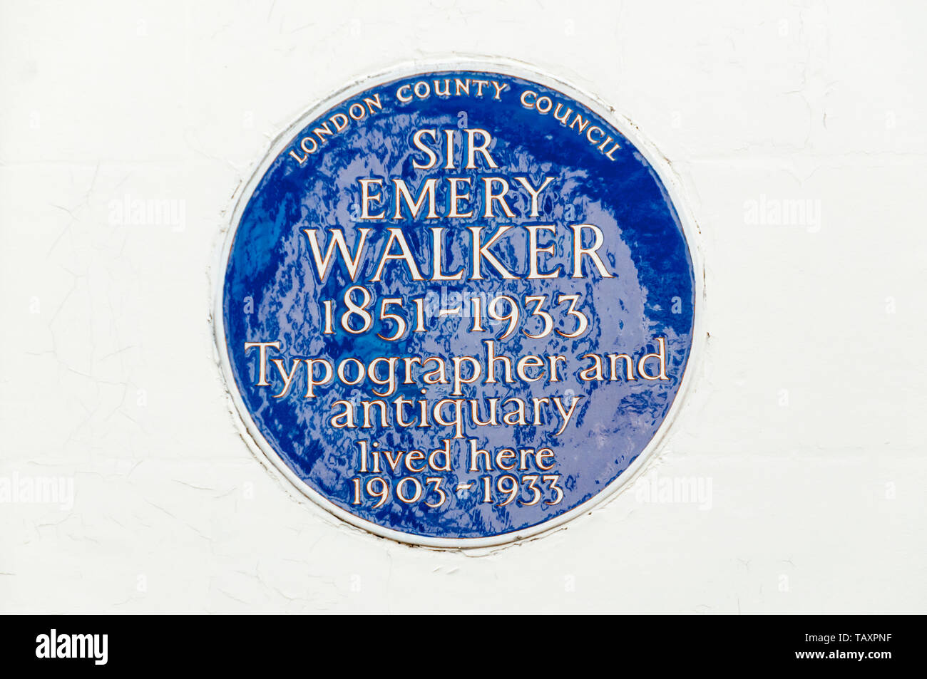 A blue plaque commemorating the typographer and antiquary, Sir Emery Walker in Hammersmith, London. Stock Photo