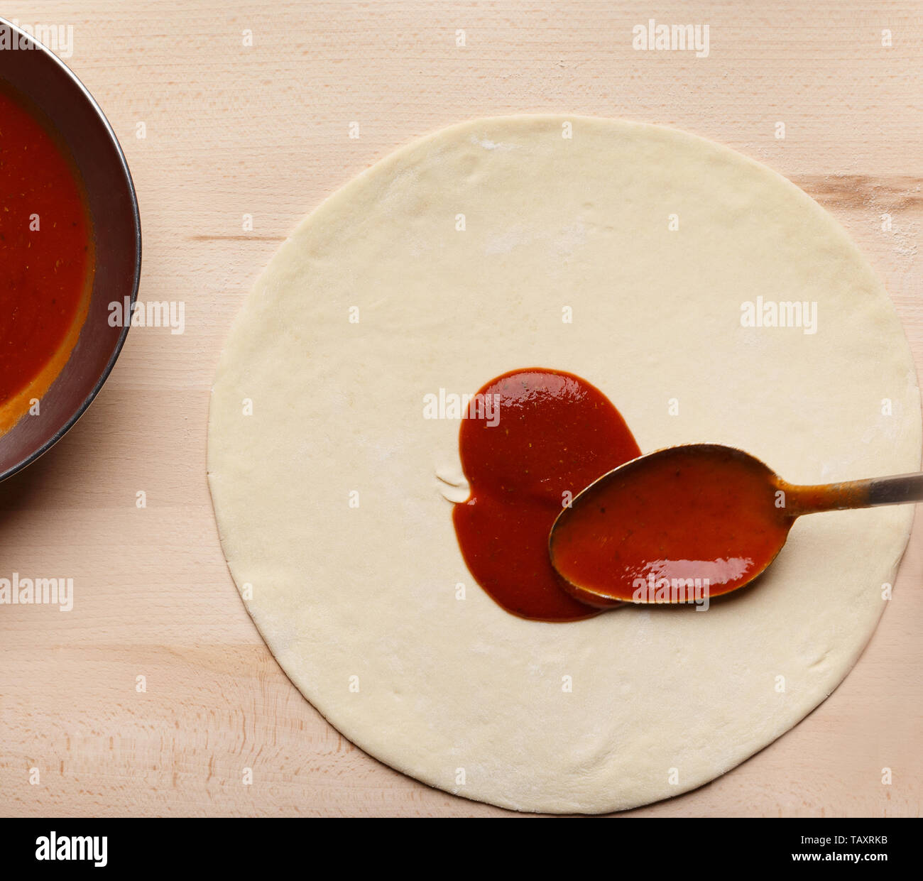 Adding Ketchup. Chef Cooking Italian Pizza, Spreading Tomato Sauce