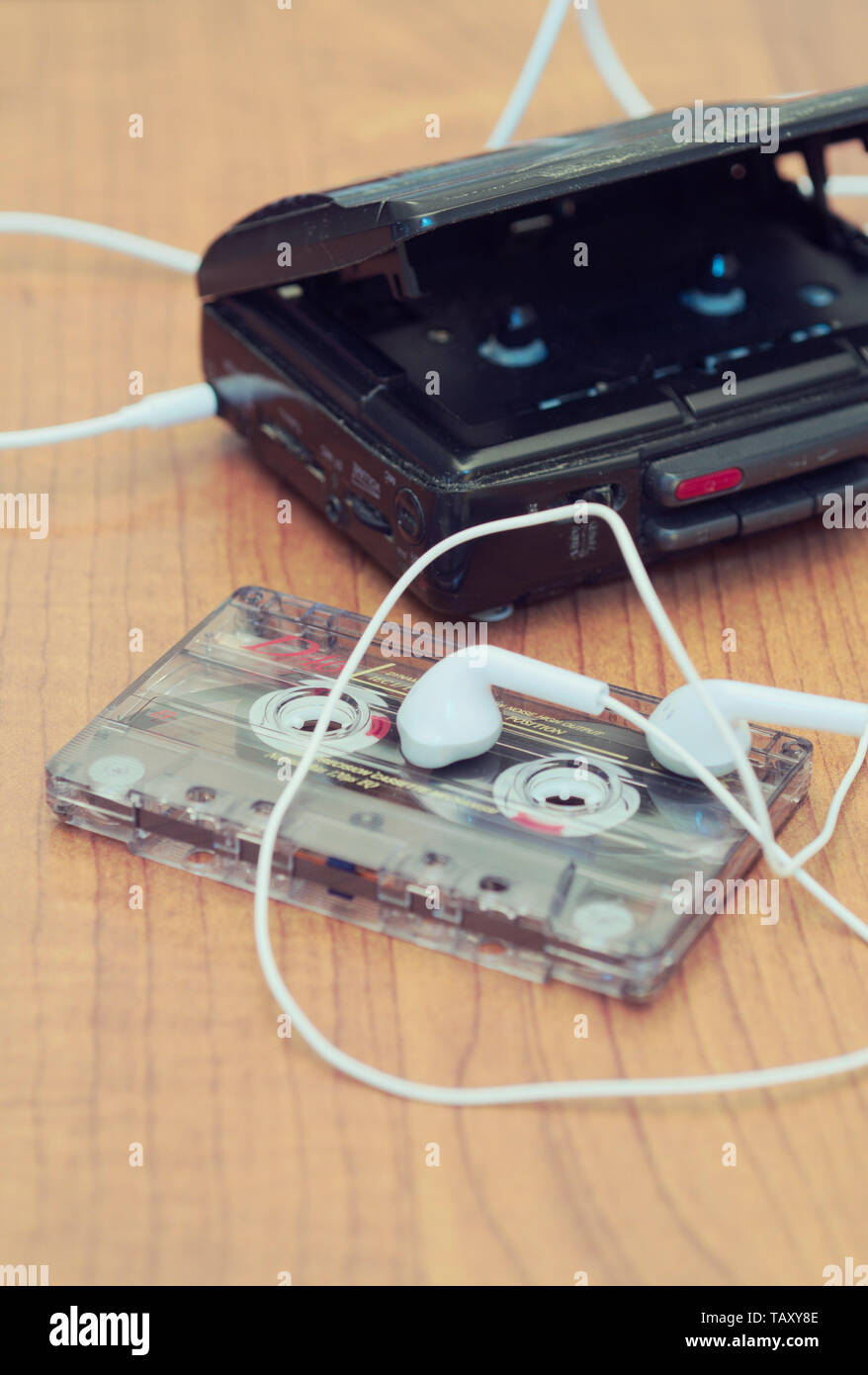 cassette player with earbuds and tape cassette Stock Photo Alamy