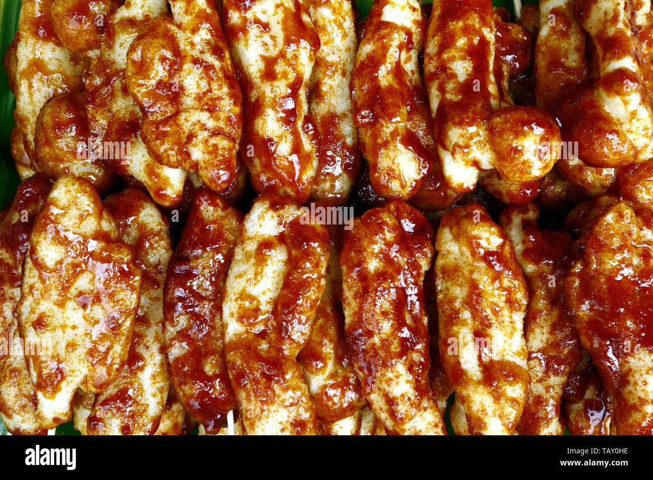 Photo of Filipino snack called Carioca or deep fried rice flour balls with caramel sauce Stock Photo