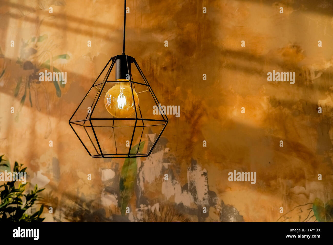 Fashion and hitech lamp in modern style. Warm tone light bulb lamp. Lamps in coffee shop and