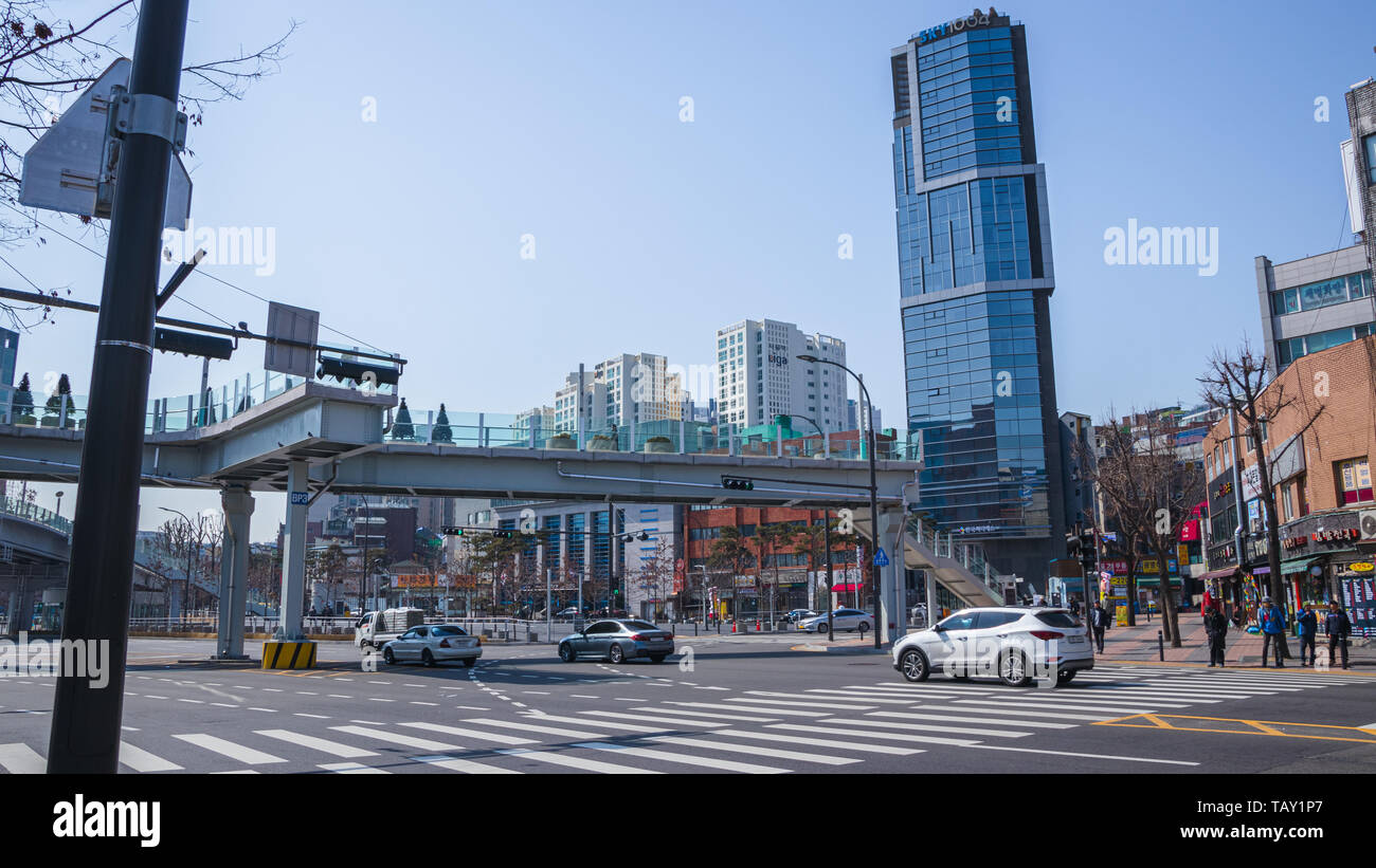 Seoul, South Korea - March 2018: typical area of the city where you can see a skyscraper, signs, traffic roads and the Seoullo pedestrian bridge Stock Photo