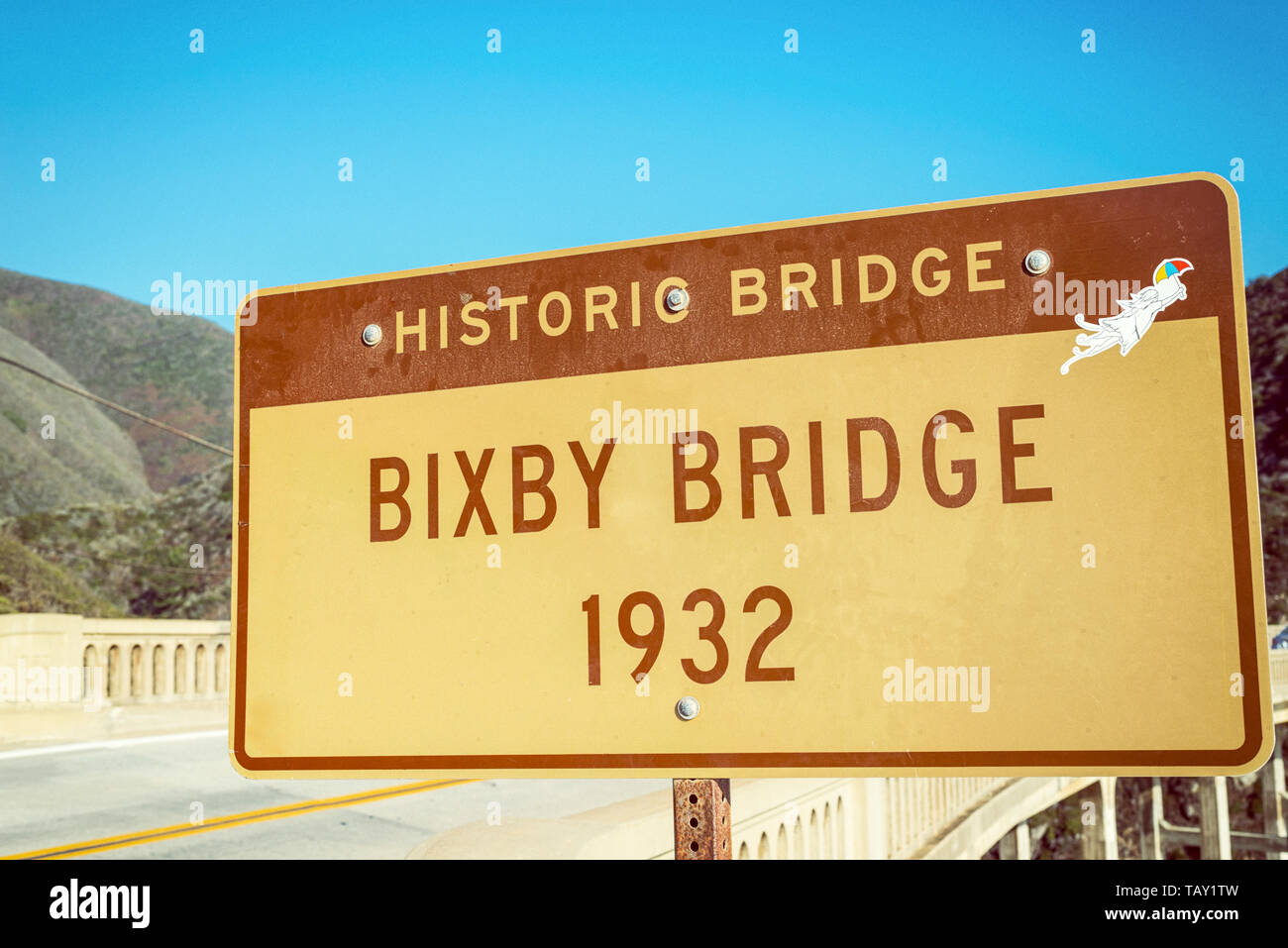 Bixby Bridge sign. Big Sur, California, United States. Photograph processed with old photo/vintage effect. Stock Photo