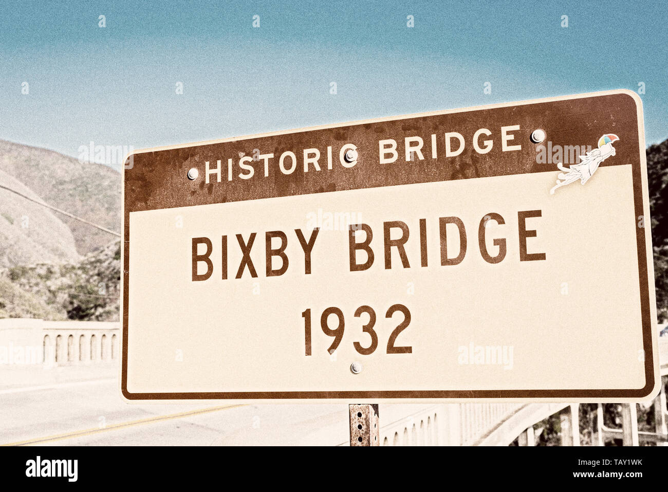 Bixby Bridge sign. Big Sur, California, United States. Photograph processed with old photo/vintage effect. Stock Photo