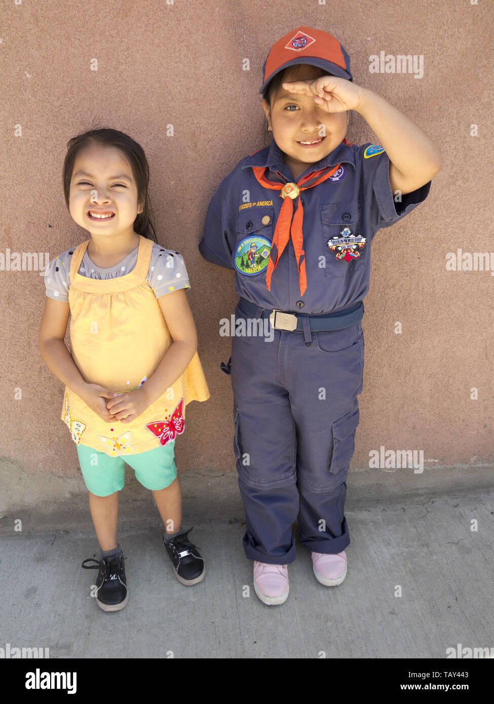 Seven year old, female, Mexican-American Boy Scout and her four year old sister at The Kings County 152nd Memorial Parade in the Bay Ridge section of  Stock Photo