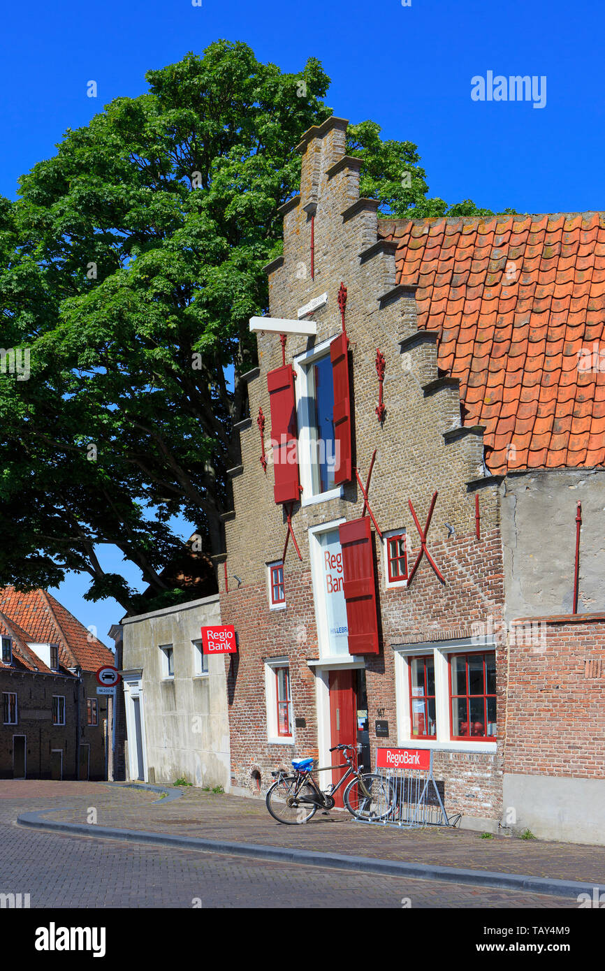 A beautiful leaning medieval stepped gable in the Old Town of Zierikzee (Zeeland), Netherlands Stock Photo