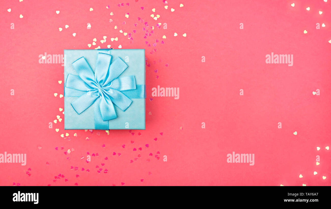 Holiday Gift box on a pink background Stock Photo