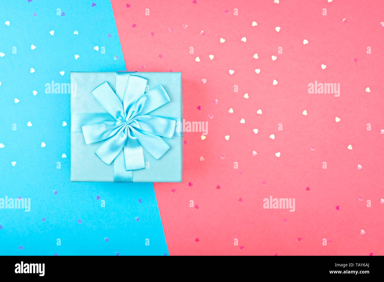 Holiday Gift box on a pink background Stock Photo