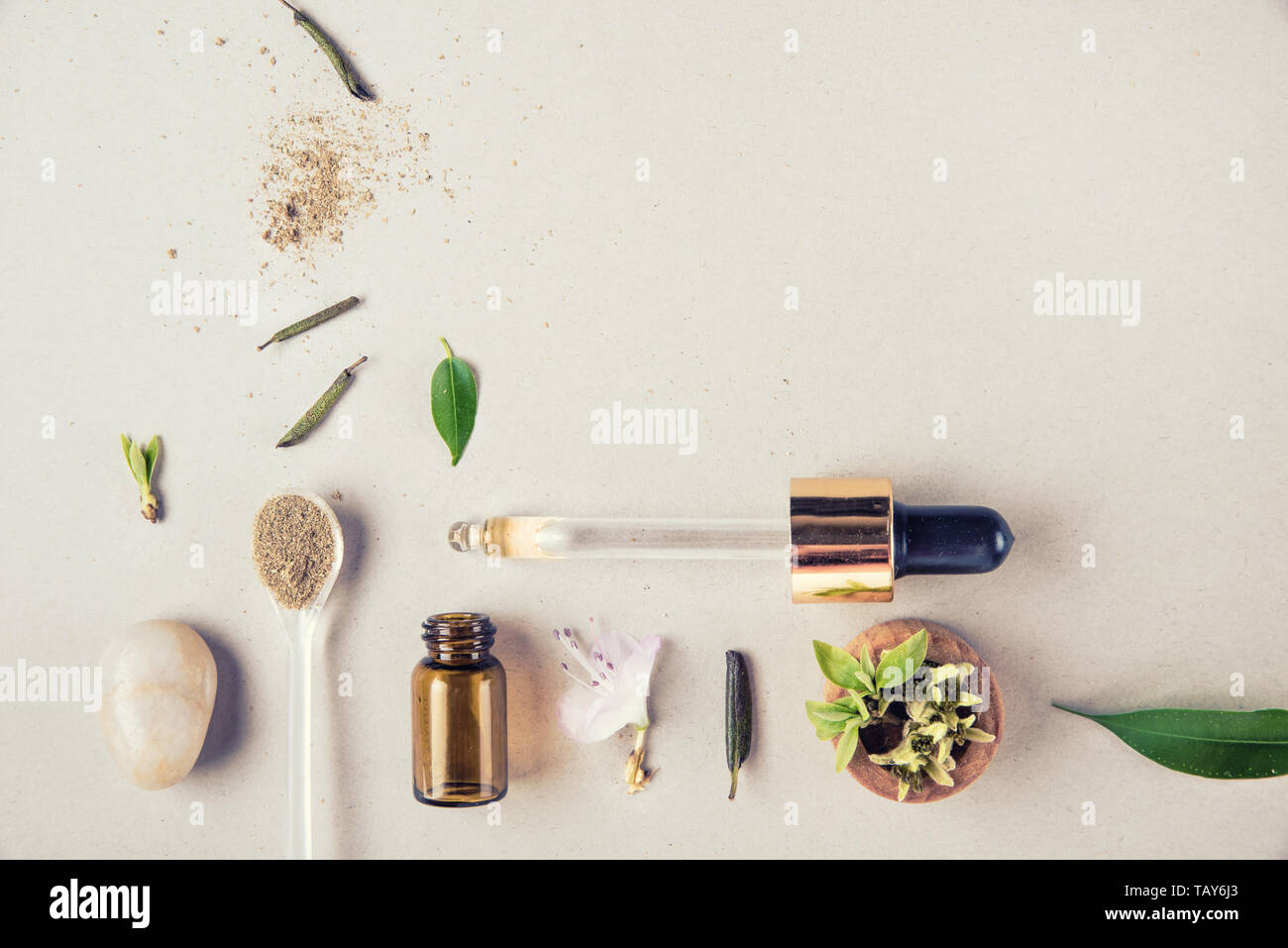 The minimal style. Natural cosmetics, handmade skin and body care. Glass bottle and vegetable ingredients. Flat lay Stock Photo