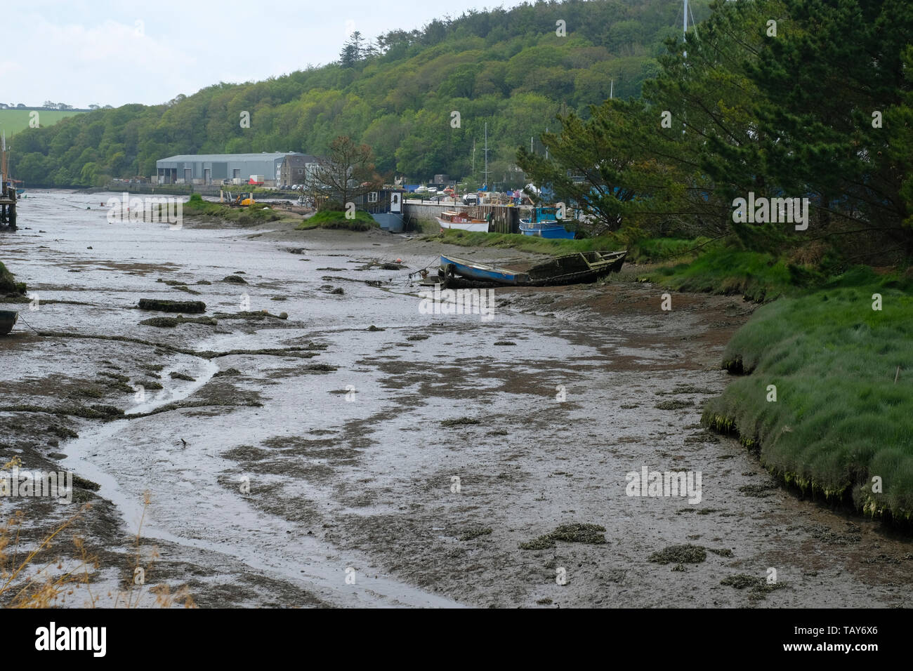 The creek at Gweek on the Helford River at low tide Stock Photo