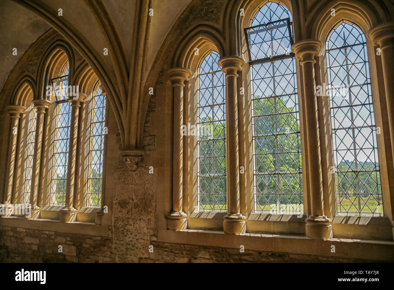 Gothic windows in the medieval abbey of Lacock, Wiltshire Stock Photo