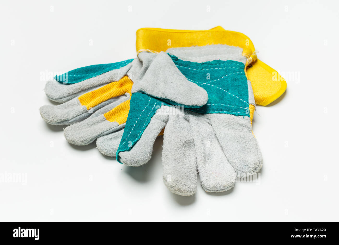 Working mens gloves isolated on white background Stock Photo
