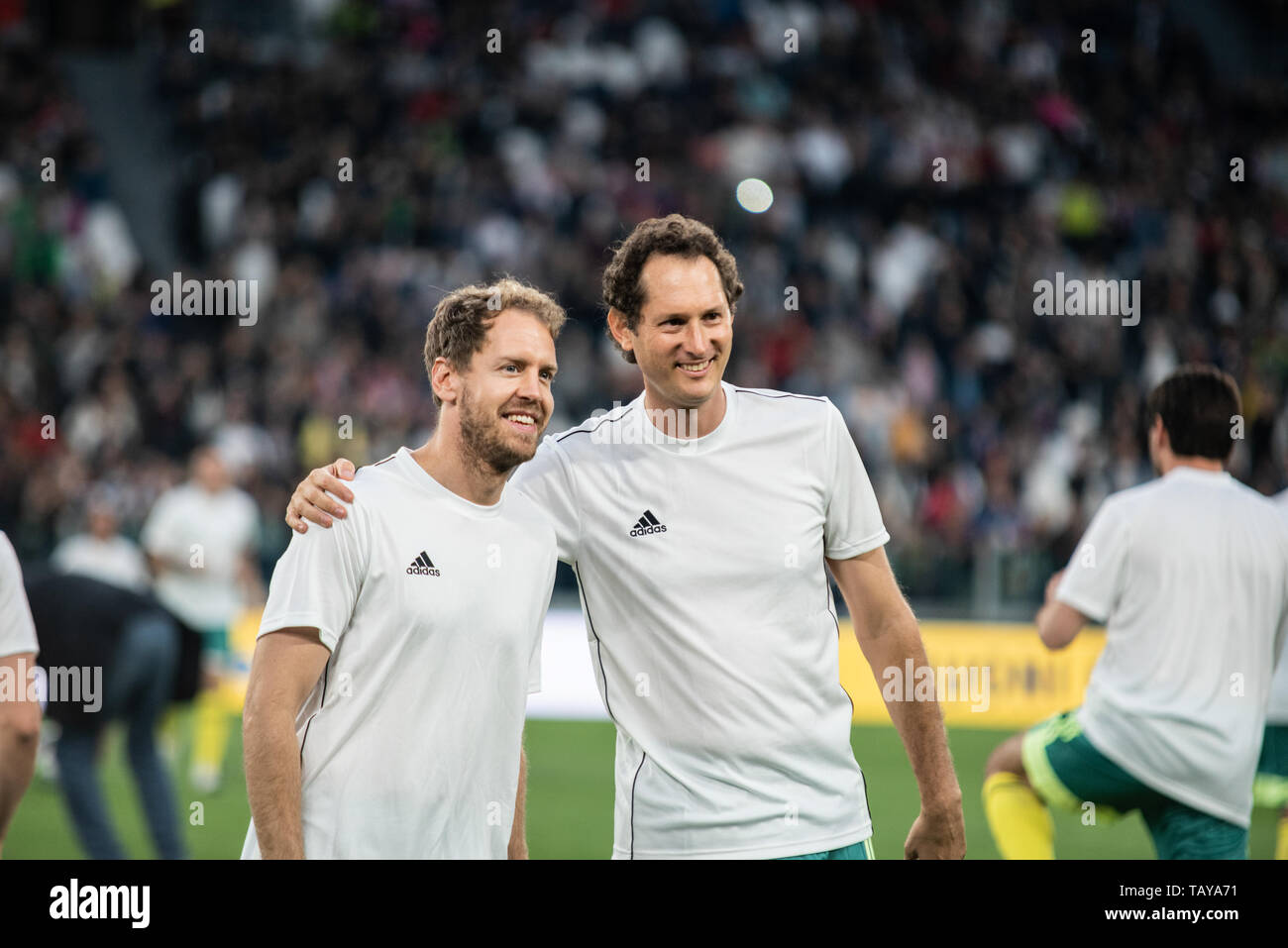 Sebastian Vettel and John Elkan during the La Partita del cuore: Campioni della ricerca vs Nazionale cantanti. Campioni della ricerca won 3-2 at Allia Stock Photo