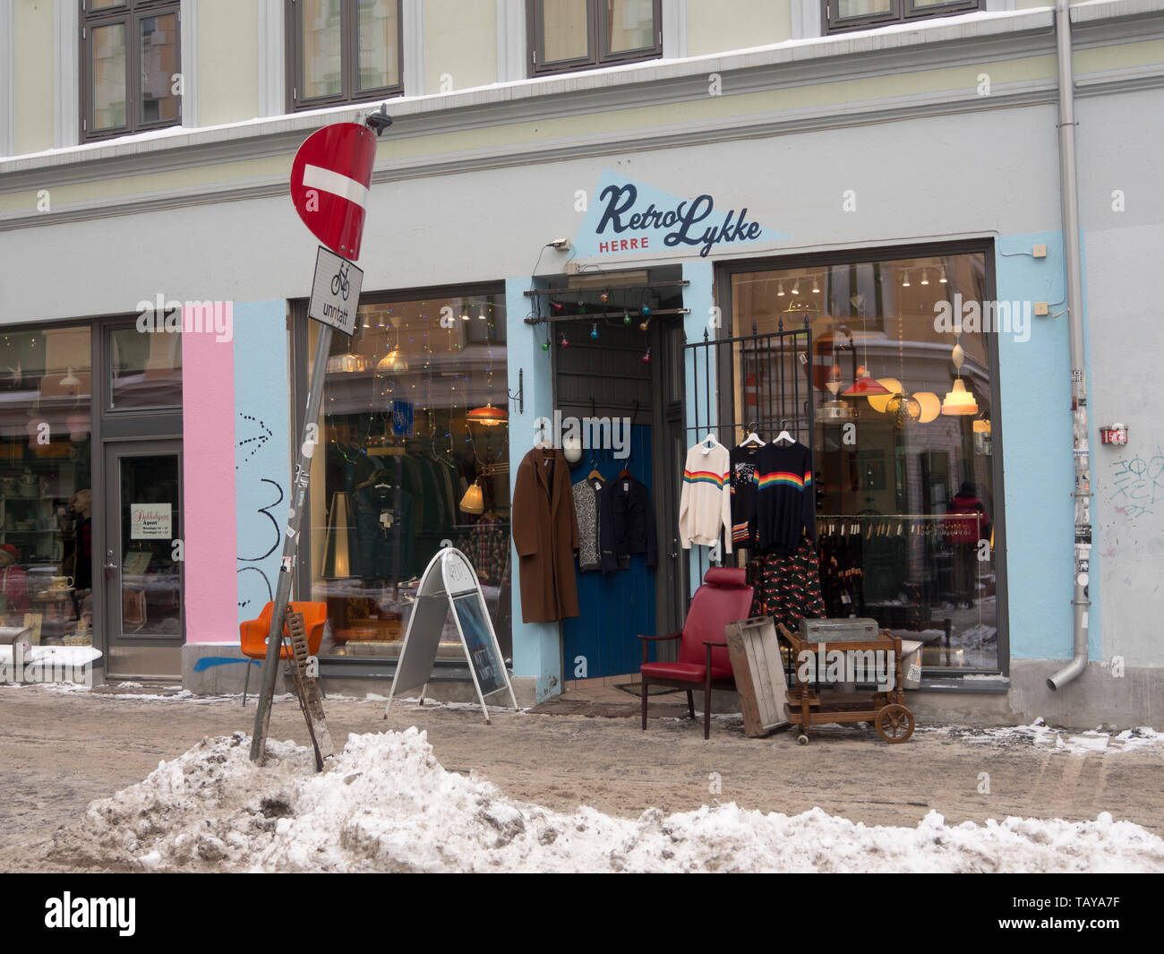 Colorful shop facade with retro clothes for men and home articles, one of many, in the popular Grunerløkka neighborhood of Oslo Norway Stock Photo