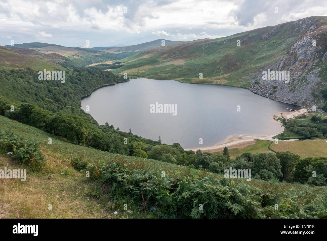 View past Lough Tay (The Guinness Lake) in the Wicklow Mountains National Park, Co. Wicklow, Eire. Stock Photo