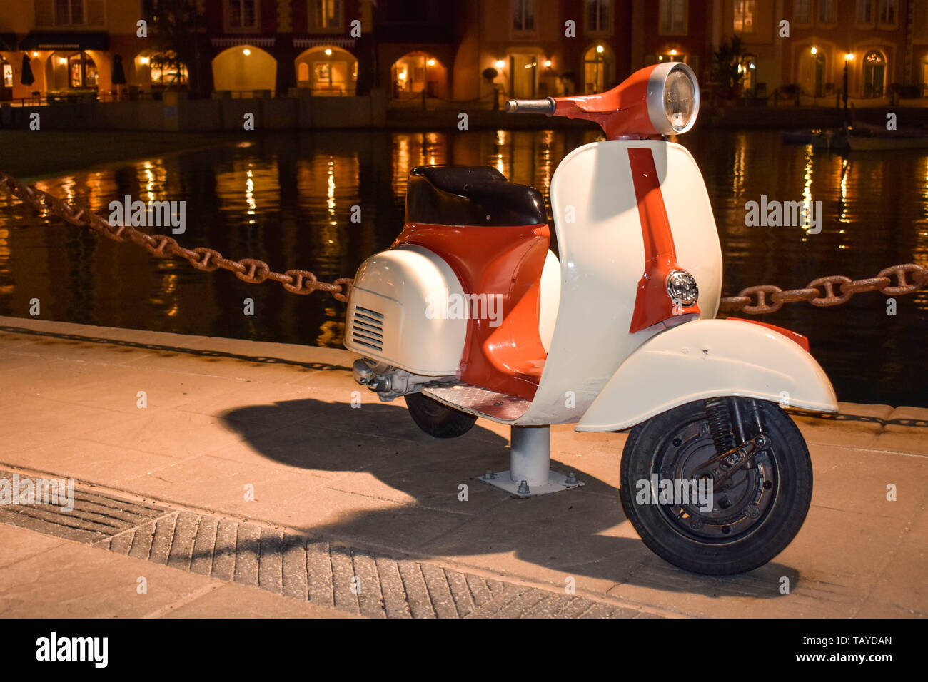 Orlando, Florida. January 05, 2019. Vintage italian scooter in lake