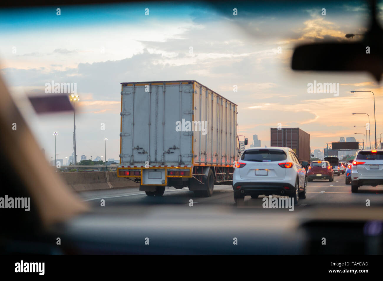 Car and trucks in Traffic jam on highway in rush hour Stock Photo - Alamy