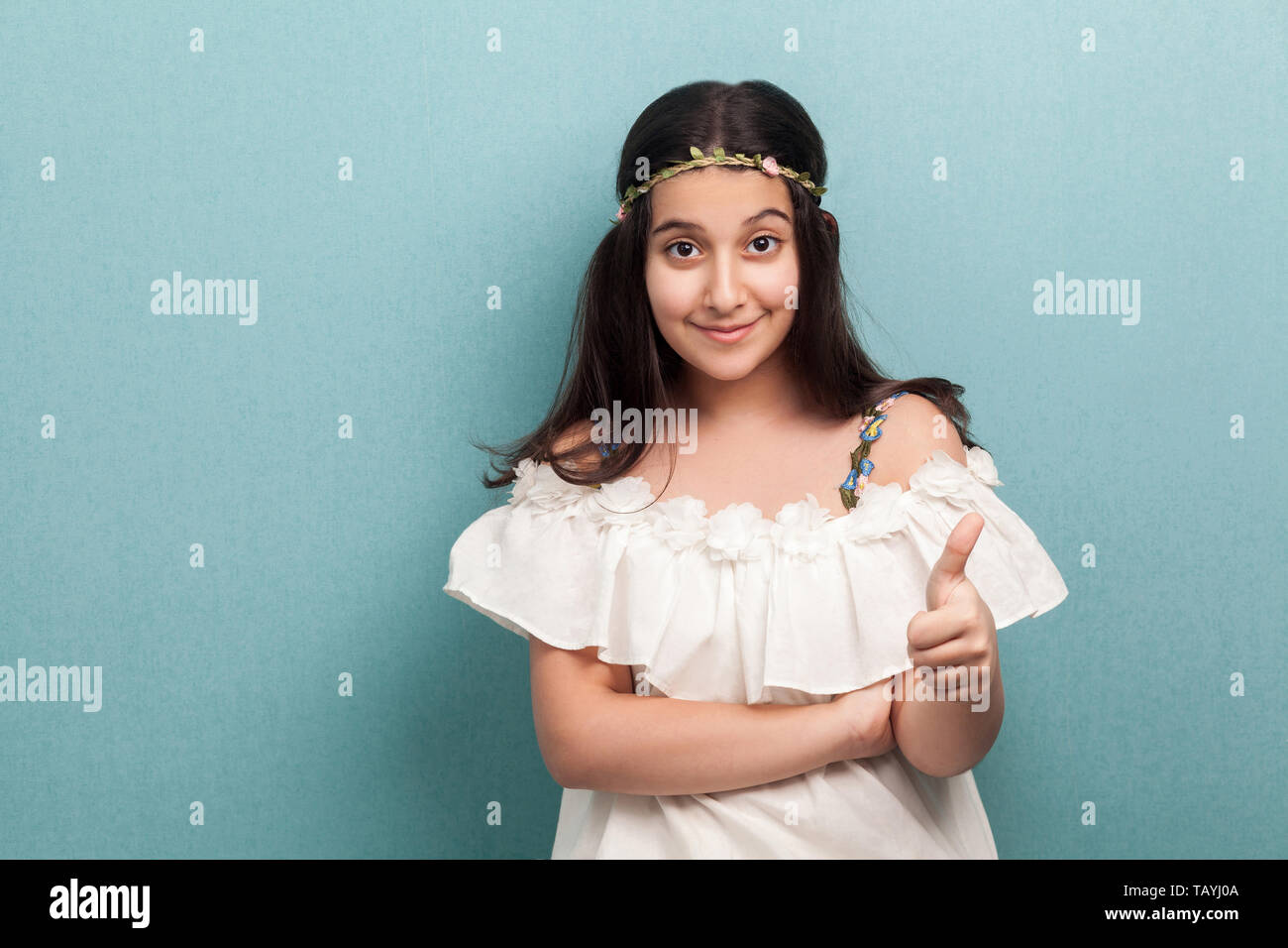 Portrait Of Happy Satisfied Beautiful Brunette Young Girl With