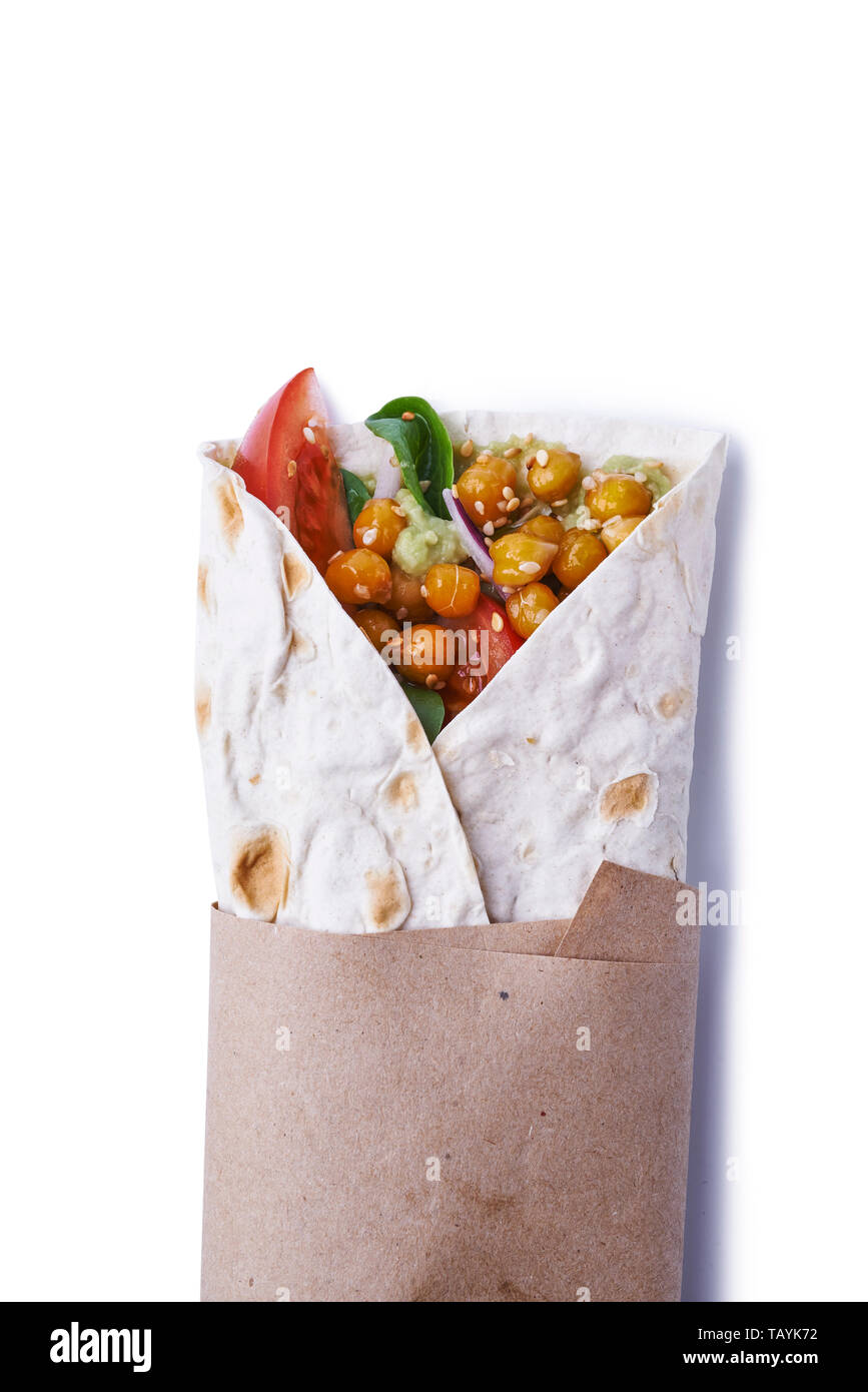 Vegan wraps in pita with chickpeas and mashed avocado isolated on white background Stock Photo