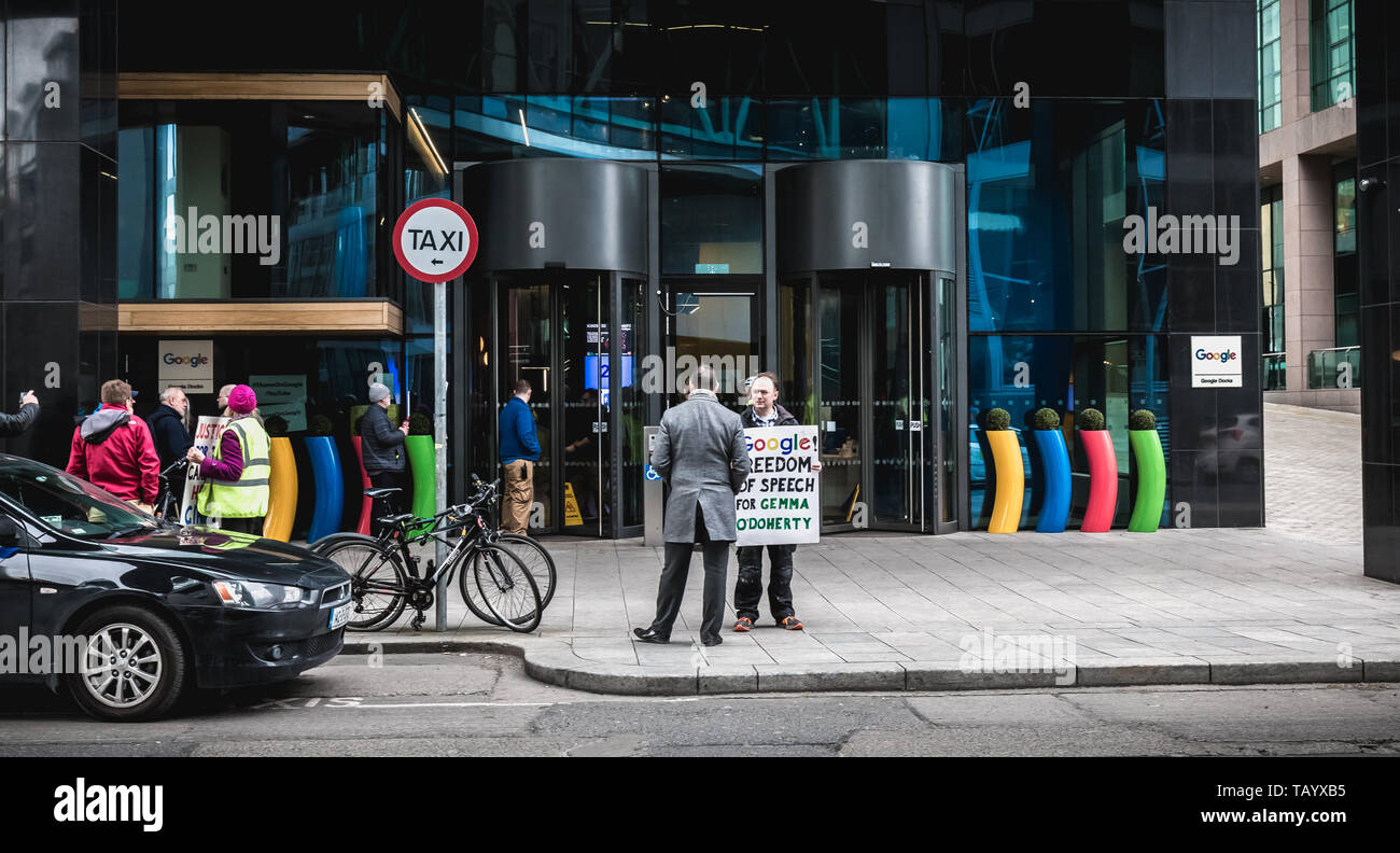 Dublin, Ireland - February 12, 2019: People protesting in front of the Irish headquarters of the multinational Google on a winter day Stock Photo