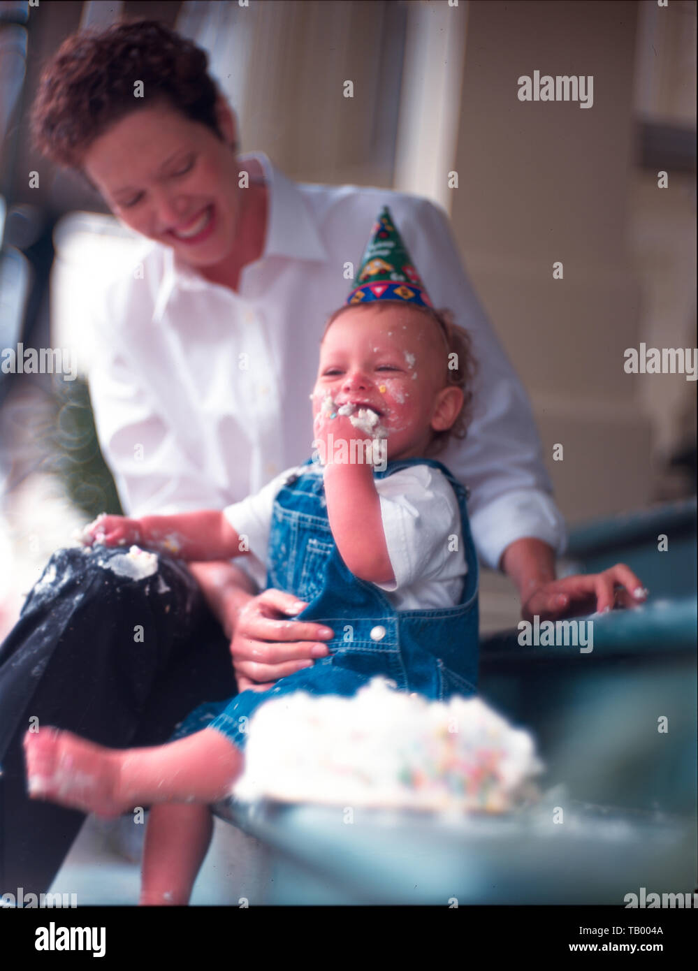 Baby and birthday cake Stock Photo