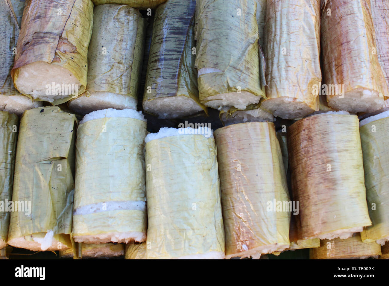Street food called lemang (rice dumpling) a Malaysian local food and a must delicacy during festive season in Malaysia, Singapore, Indonesia and Brune Stock Photo