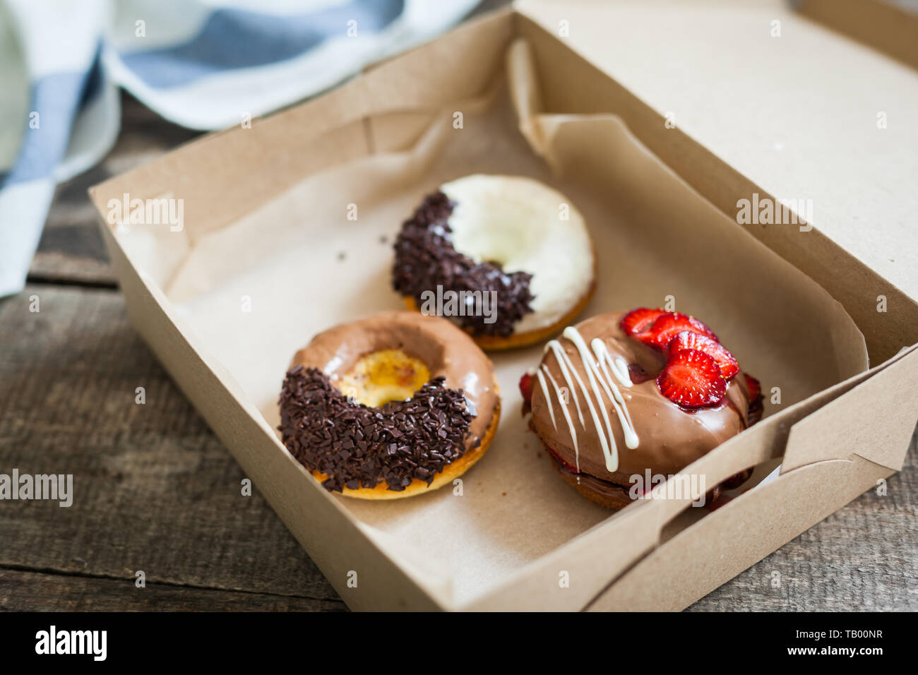 Colorful donuts in box Stock Photo - Alamy