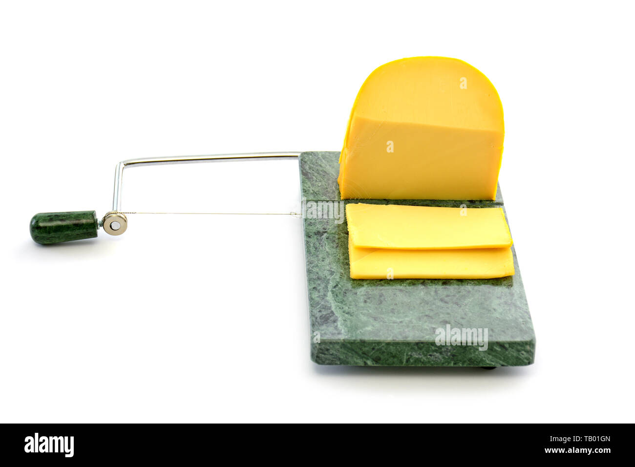 Wedge of Gouda cheese and slices on jade wire cheese slicer in