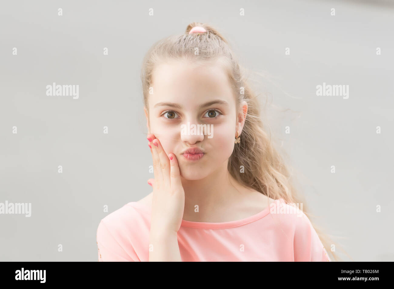 Baby face. Adorable baby face look. Little child with cute face. Small girl  with healthy young face skin and long blond hair Stock Photo - Alamy